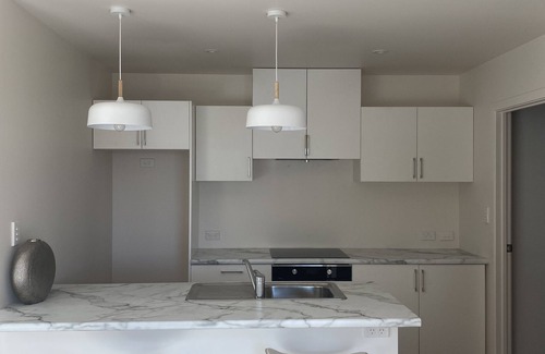 Whangaparaoa House | Superb Clifftop Flat with views back to Auckland