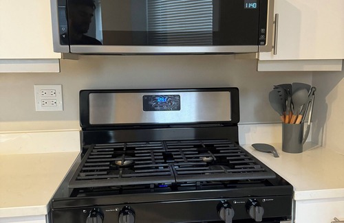 Uptown Condo | SuperHost Large Roommate style 2 Bedroom, 2 Bath, Patio, Sunroom, L Kitchen