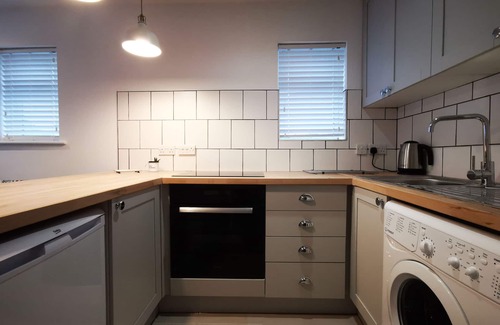 Wittering Apartment | Surfer's Retreat