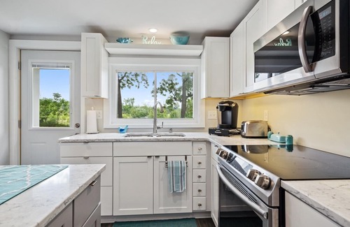 East Leroy House | Swan Haven is a NEWLY Remodeled Lakehouse with a Gorgeous Sunset View!