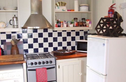 Butlerstown Cottage | Sweet Coach House is located next to a stunning tidal beach on the Wild Atlantic Way