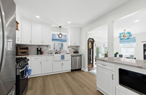 Oxford House | Tan Lake Oasis: Modern Lakefront w/Game Room, 2 min to Downtown Oxford