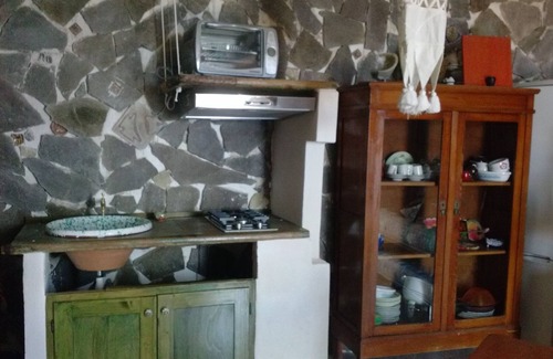 Malfa House | Terrace and garden overlooking Stromboli and Panarea,