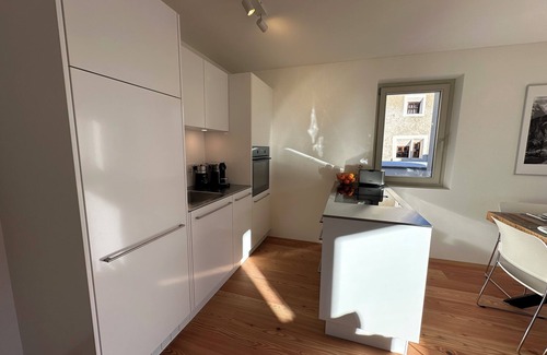 Zuoz Apartment | Terrassa Apartment: Sun Terrace, Wellness, and Alpine Charm
