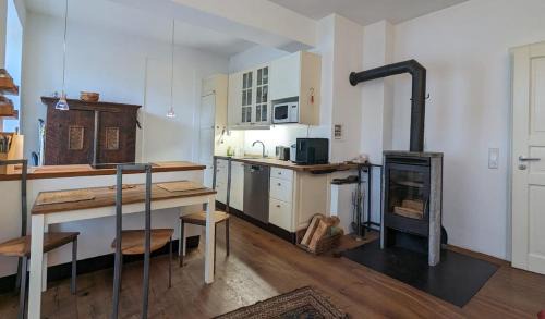 Wasserburg am Inn Apartment | Terrassenwohnung in historischem Brauereigebäude mit Blick ins Grüne