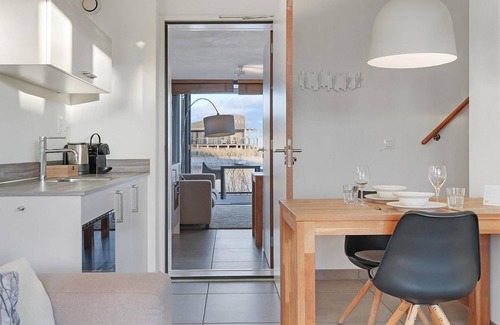 Ouddorp Hotel | The 4-person Studio consists of two 2-person studios, connected on the ground floor with an adjoining door, Featuring terraces with views of both the landside and the water.