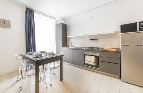 Chinatown Apartment | The apartment is located on the third floor of a building without a lift.It comfortably accommodates 4 people in 60 mqs, with a double bed, two single beds and a sofa bed in the living room.The accommodation is strategically located, a 5-minute walk fro