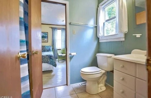 Sunset Beach Cottage | "The Bird House" A Cozy Historic Beach Cottage walking distance to beach!