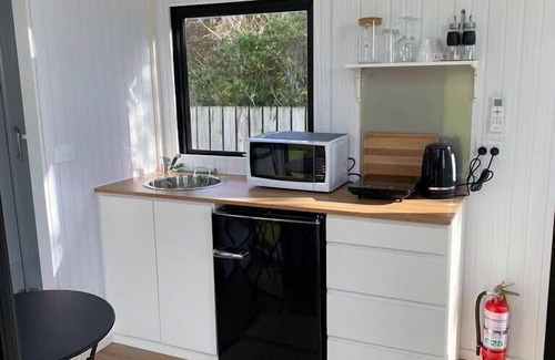 Waimangaroa House | The Coast 2 by Tiny Away