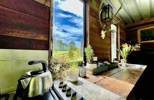 West Woombye House | The Dairy Cottage - rustic timber cottage with outdoor living, set on acreage