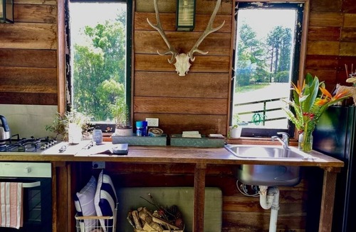 West Woombye House | The Dairy Cottage - rustic timber cottage with outdoor living, set on acreage