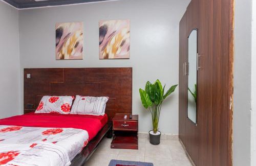 Soroti Apartment | The Den Soroti Red & White