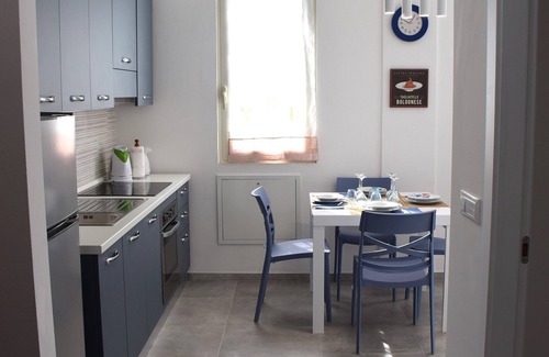 San Donato Apartment | THE DIMORA IN BLUE NEAR THE FAIR, UNIVERSITY, SANT'ORSOLA POLICY CENTER.