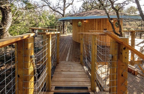 Paige Cabin | The Elf's Aerie, An Enchanting Dog-Friendly Treehouse in the Lost Pines Shire