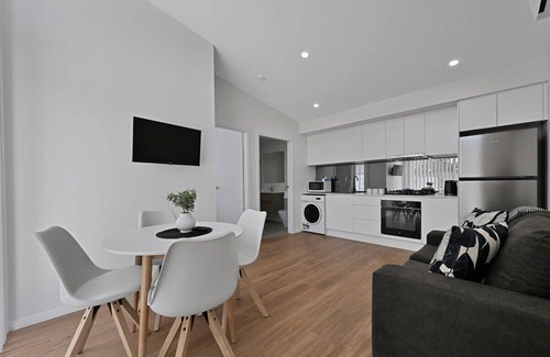 Orange Apartment | The Elm Apartments - The Black & White Room