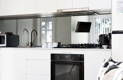 Orange Apartment | The Elm Apartments - The Black & White Room