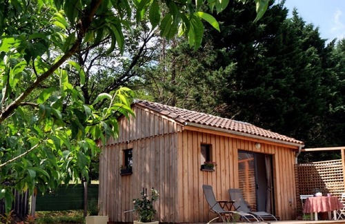 Saint-Leon-sur-Vezere Ski Chalet | The Ensoleillade Ecological small wooden chalet of 19m2 in garden with view.