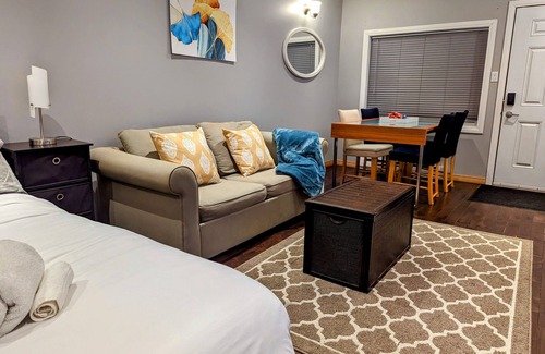 St. Vital Apartment | The EthlynGwen- Main Floor with Private entrance and Hot tub