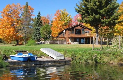 Upper Peninsula Michigan House | The Good Old Summertime - blue skies, green grass, and lovely water. Come enjoy!