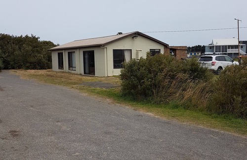 Peterborough House | The Great Ocean Rd Shack with river water views from every window.