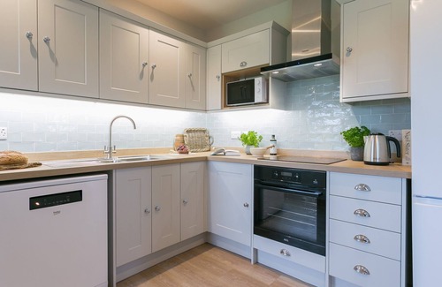 Caergeiliog Cottage | The Gun Room - an on the beach that sleeps 4 guests in 2 bedrooms