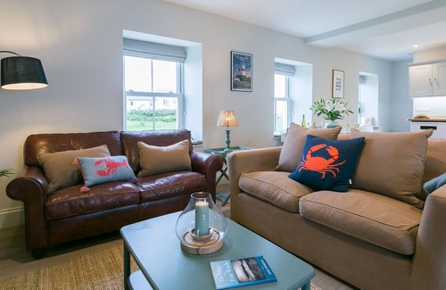 Caergeiliog Cottage | The Gun Room - an on the beach that sleeps 4 guests in 2 bedrooms