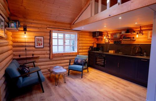 Banavie Apartment | The Happy Cabin Woodland Hideaway by the River