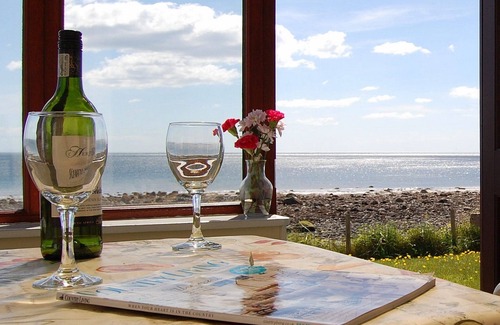 Monreith Cottage | The Haven nestling in an idyllic setting on the shore of Luce Bay in Galloway a