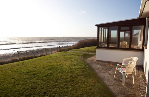 Monreith Cottage | The Haven nestling in an idyllic setting on the shore of Luce Bay in Galloway a