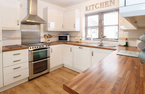 West End Cottage | THE HAYBARN, pet friendly, with a garden in Necton
