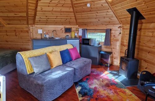 Amroth Apartment | The Hive - Unique log cabin with wood burning stove