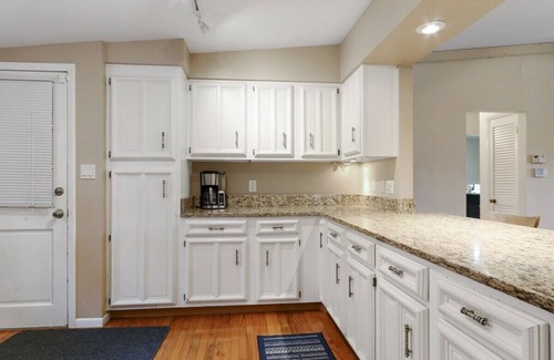 Powers Lake House | The Lake House on Powers |Grassy Frontage |Lakeside Deck |Rec Room w/Pool Table & Bar |Fire Pit