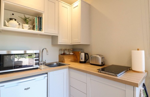 Checkley Cottage | THE LODGE AT MIDDLETON HOUSE, pet friendly, with a garden in Stone