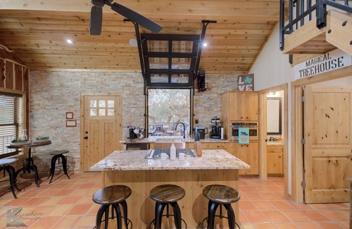 Baird House | "The Magical Treehouse" offers an enchanting experience for up to six guests.
