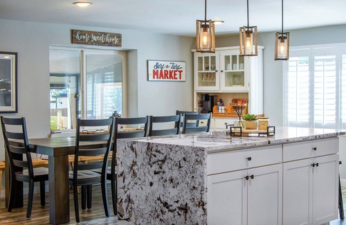 Edgewater House | The Mile High Haven: An Entertainers Dream with Hot Tub + Perfect Location