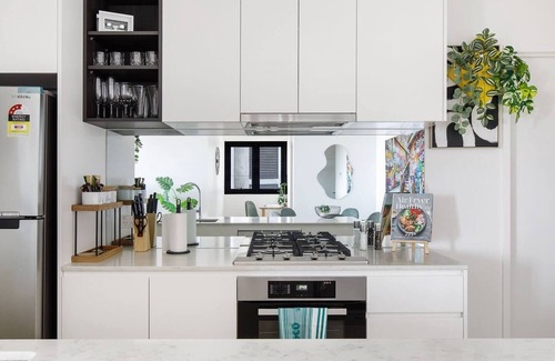 Southbank Apartment | The Monstera Chic Urban Retreat with Shared Pool