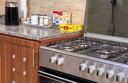 Sahab Apartment | The Mosaic HomenChic apartment in Madaba with Modern Amenities