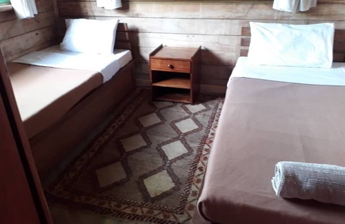 Western Region Ski Chalet | The Observatory Lodge at Kichwamba escarpment overlooking Queen Elizabeth NP.