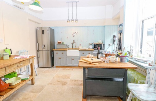 Totland Bay Cottage | THE OLD KITCHENS, pet friendly, with open fire in Totland
