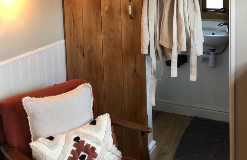 Brushford House | The Orchard Hut- A bespoke shepherds hut with wood fired hot tub.