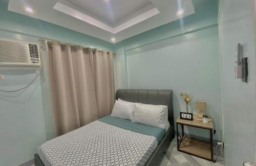 Valenzuela Apartment | The PAD Staycation 2BR Condo with PS4, Netflix, WIFI