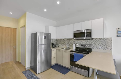 Bejuco Condo | The Palms: Beachfront Condo with AC and pools!