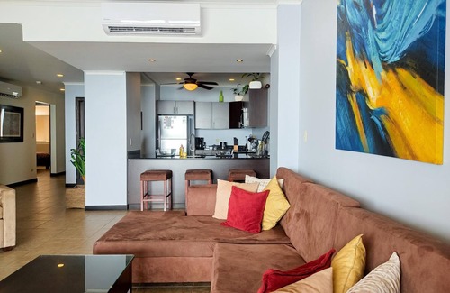 Barrio Los Villalobos Apartment | The Palms Jaco 1001 penthouse on the beach