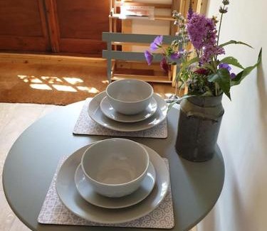 Kilgetty Apartment | The Potting Shed near Tenby, 100" Projector, Four poster bed, On-site HOT TUB access via Spa Pack