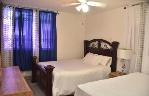 Saint Andrew Bed & Breakfast | The president room 5 minutes to Devon House 4 Waterloo Avenue Kingston