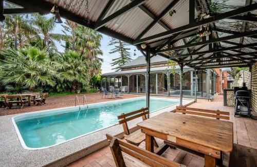 Glenelg South House | The Red Door: Expansive Home/Pool/4 BR w Ensuites