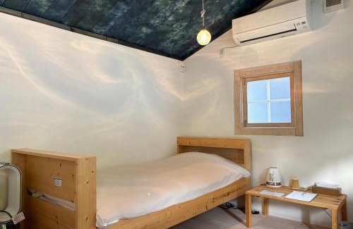 Toyo House | the room