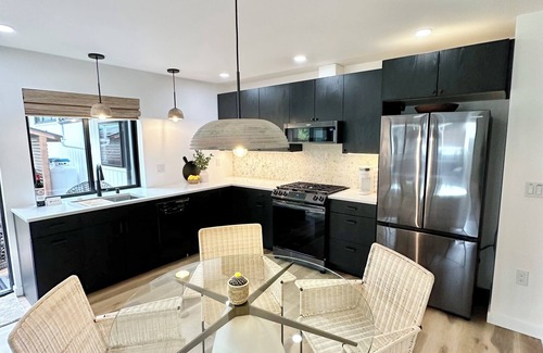 Mendenhall Valley House | The Seedling - outdoor gas fireplace, hot tub & grill near shops & trails