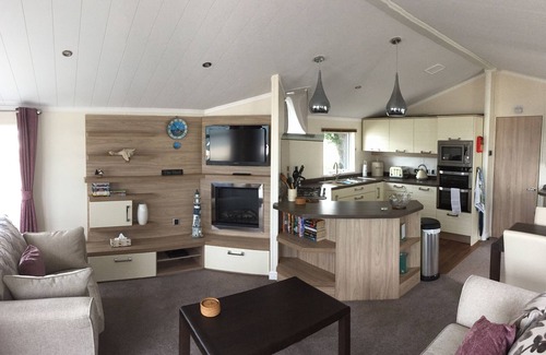 Mudeford Ski Chalet | 'The Shed', A luxury lodge with a view, Sandhills Holiday Park Mudeford