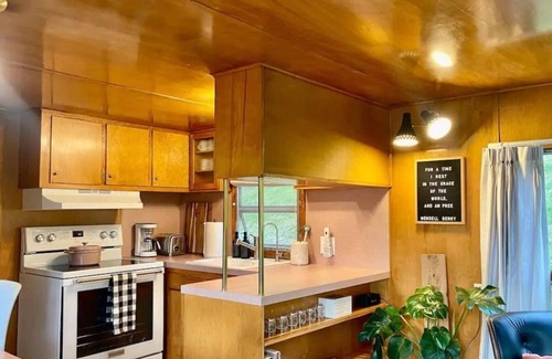 Arroyo Grande Apartment | The Spartan is a fun 1950's vintage trailer under oak trees overlooking a 1 acre organic farm!